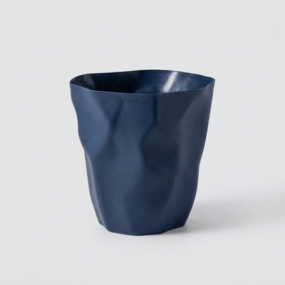 CURVEBIN – Irregular Shape Wastebasket for Space-Saving Design