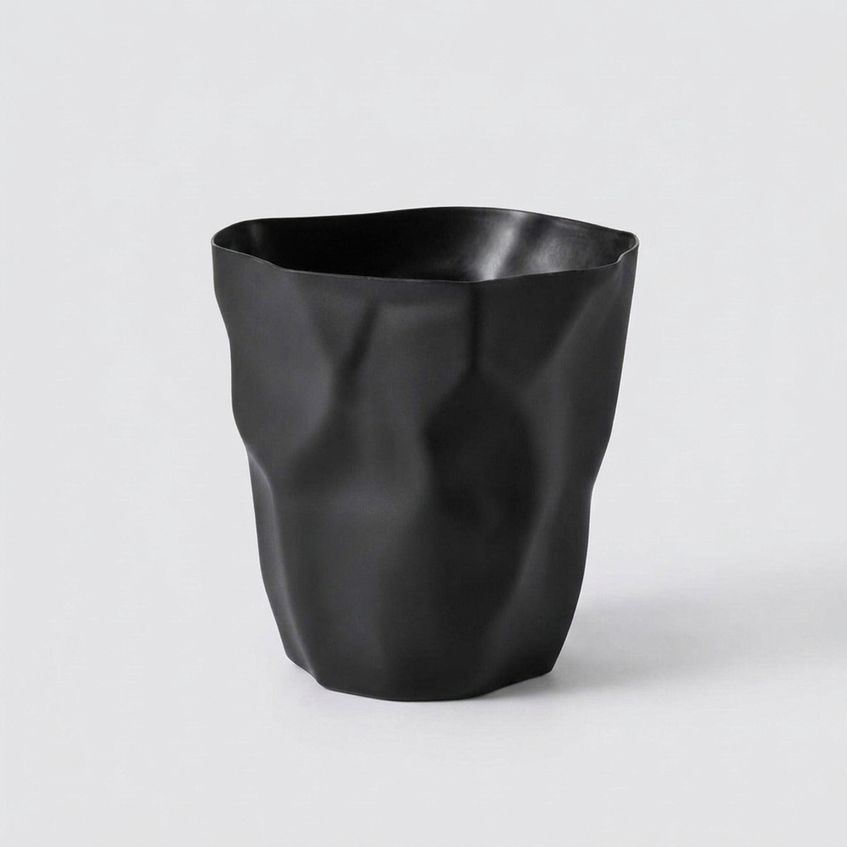 CURVEBIN – Irregular Shape Wastebasket for Space-Saving Design