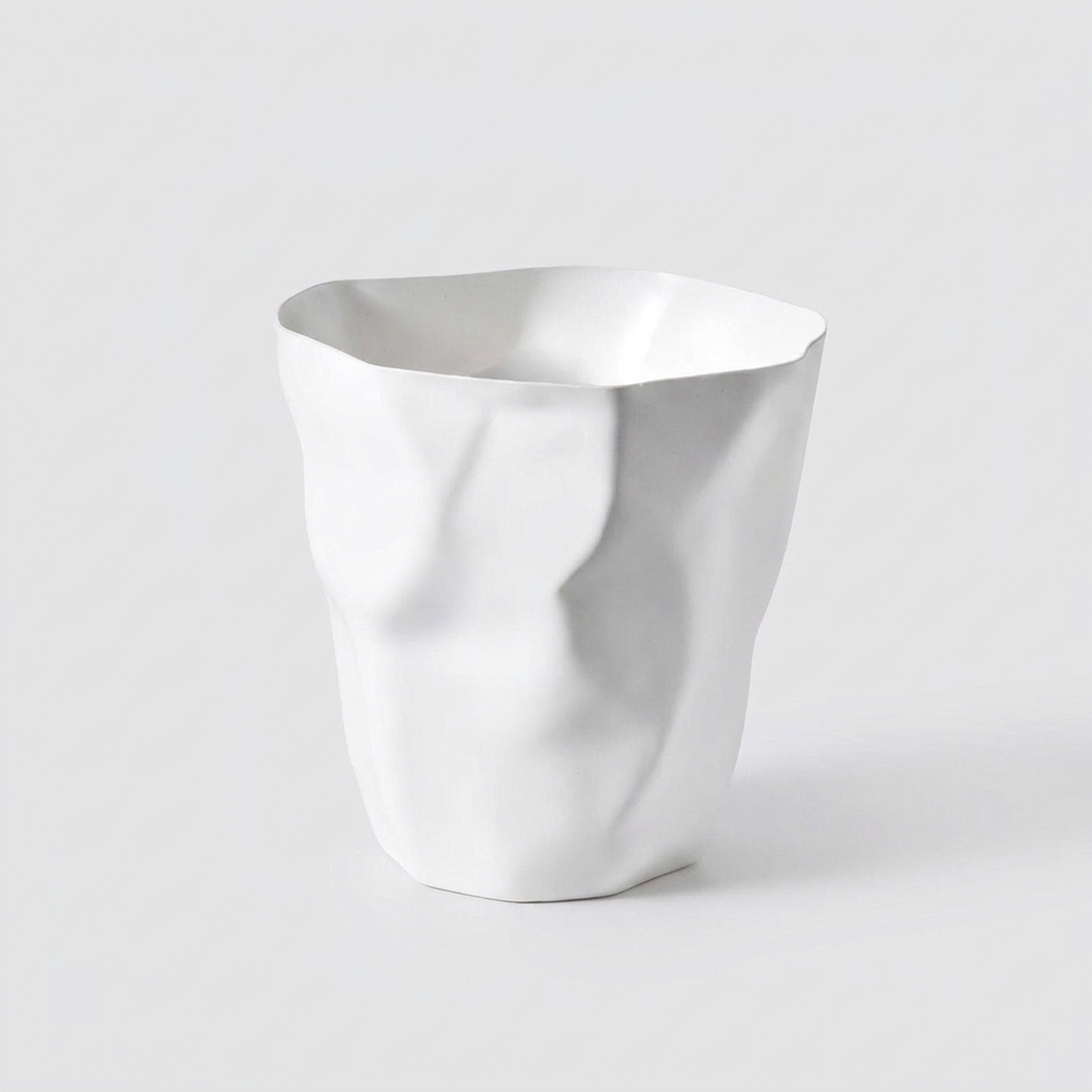 CURVEBIN – Irregular Shape Wastebasket for Space-Saving Design