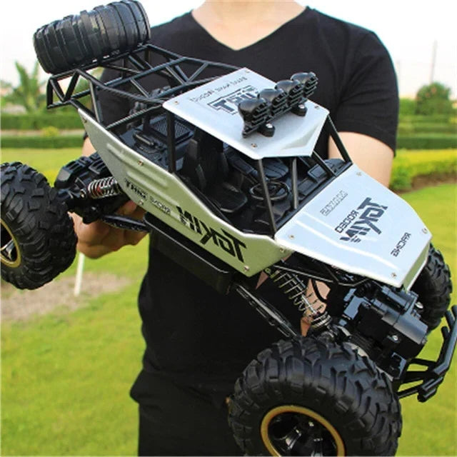 Remote Control Off-Road Racing Truck 4WD All-Terrain Crawler for Kids 1:12 Scale 2.4GHz Wireless 260 ft Range High-Speed Climbing Vehicle