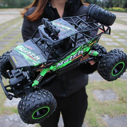 1:12 Scale Hobby-Grade Climbing Truck with 2.4GHz Radio & Shock-Absorbing Suspension for Dirt, Rocks, Grass