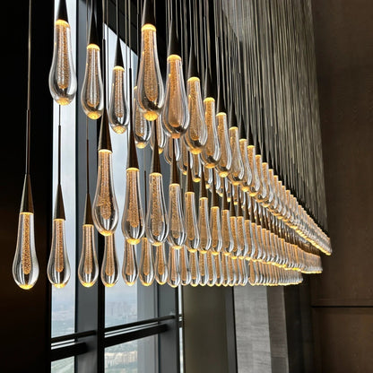 Cascading Raindrop Linear LED Chandelier – Textured Glass Orbs, Adjustable Height, Vaulted Ceiling Ready – 37 to 120 Inch Options for
