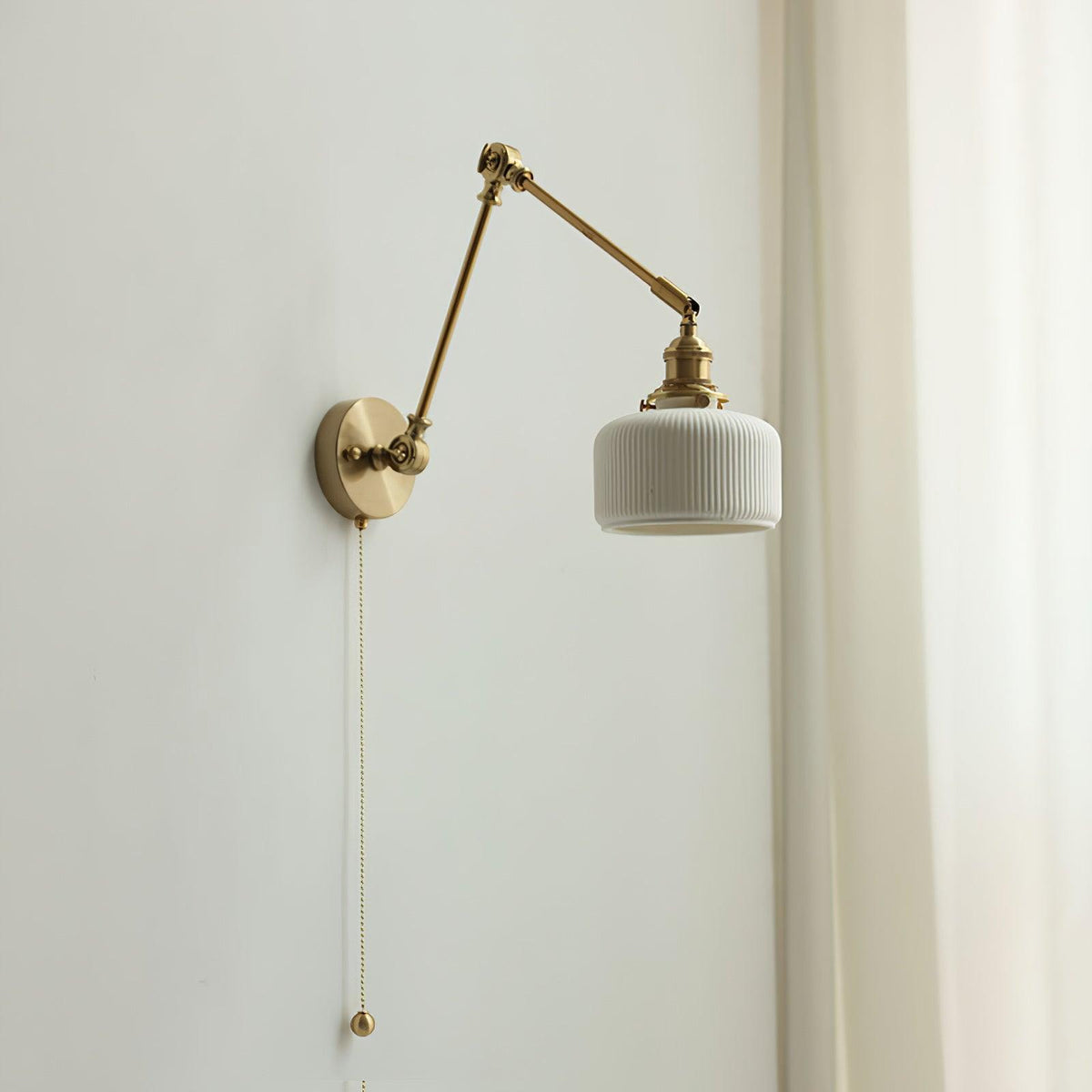 Swing Arm Reading Sconce with Ceramic Shade | Rotatable Bedside Wall Fixture with Pull Chain Switch | Modern Brass Task Light for Bedroom