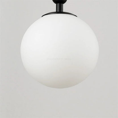 Globe Wall Sconce with 5.5-Inch Glass Shade Black and Gold Finish Bedroom Hallway Ambient Light E14 Socket Modern Minimalist Design for Entr