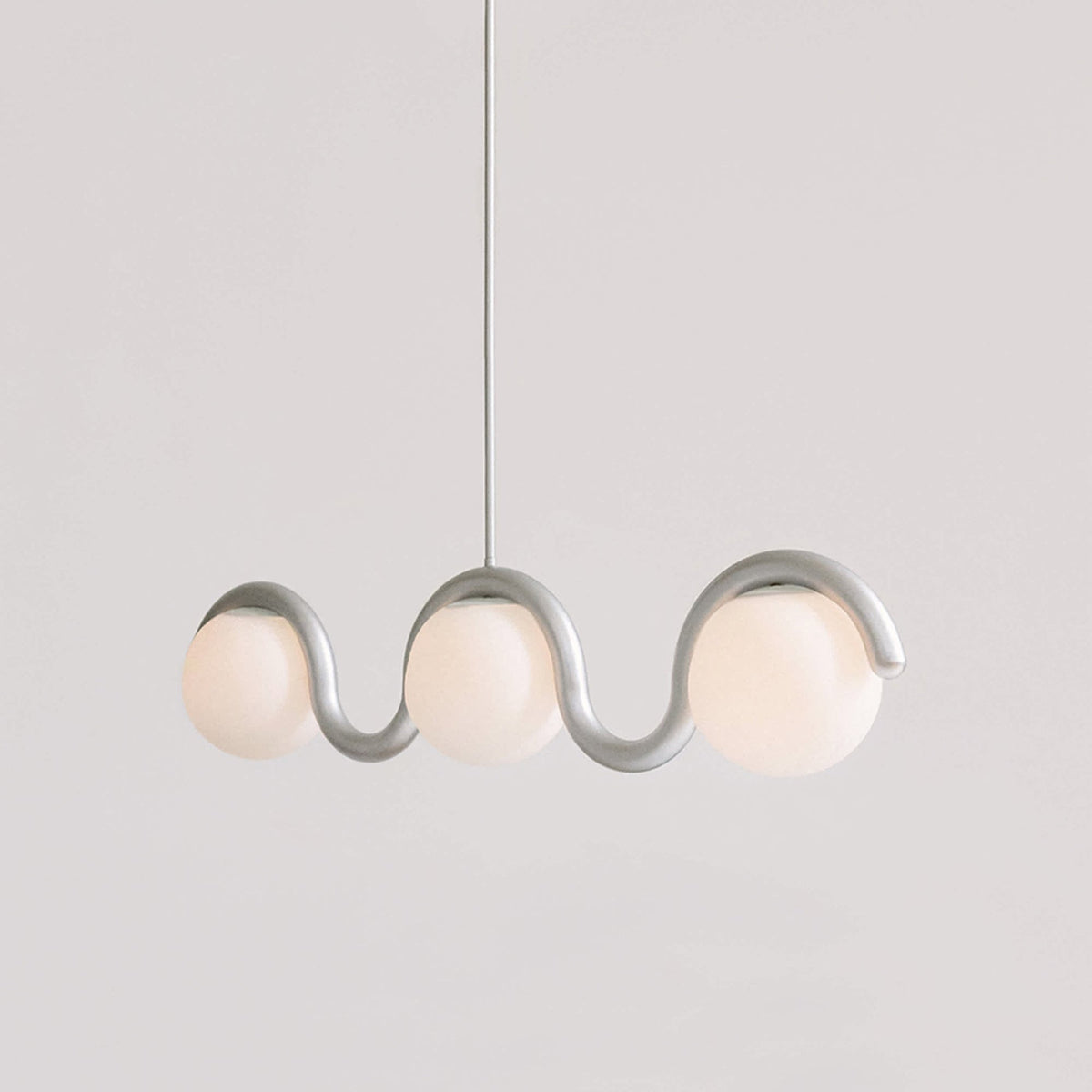 Modern Linear Chandelier with Curved Metal Frame & Glass Sphere – Art Nouveau Pendant Light for Dining Room