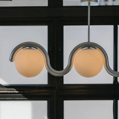 Modern Linear Chandelier with Curved Metal Frame & Glass Sphere – Art Nouveau Pendant Light for Dining Room