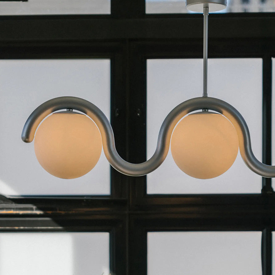Modern Linear Chandelier with Curved Metal Frame & Glass Sphere – Art Nouveau Pendant Light for Dining Room