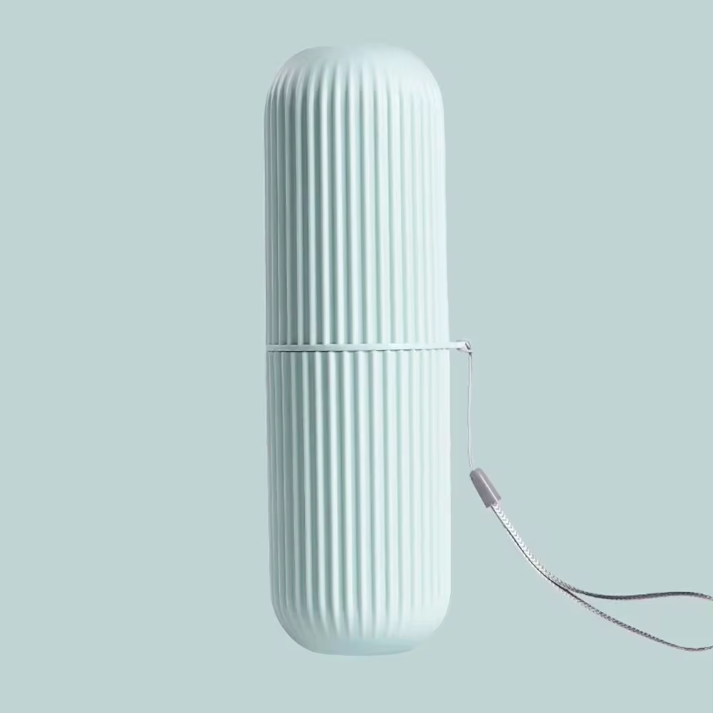TRAVEL CUP – Portable toothbrush and toothpaste storage case designed for hygienic and compact travel organization