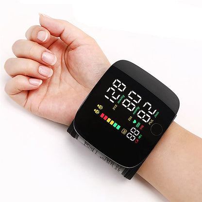 Wrist Blood Pressure Monitor Rechargeable with Voice Alerts LCD Display Portable Health Tracker Dual User Memory 99 Reading Storage