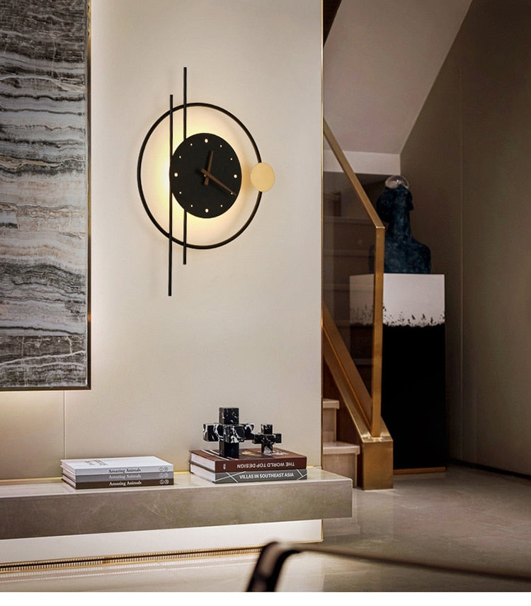 Backlit Metal Wall Clock 22 in × 16 in Gold Black Round Geometric Timepiece for Home Office Entry Foyer Den Workspace Ambient Glow Battery O