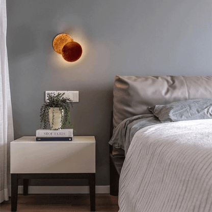 Adjustable Eclipse Wall Sconce 12-Inch Diameter Rotating Metal Disc Black Finish Ambient Accent Light for Bedroom Living Room Hallway Indoor