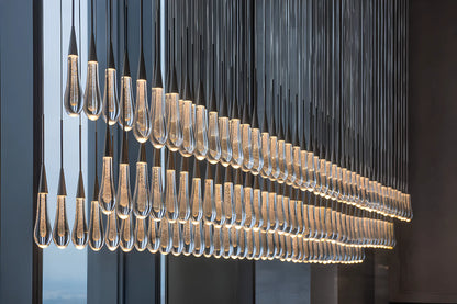 Cascading Raindrop Linear LED Chandelier – Textured Glass Orbs, Adjustable Height, Vaulted Ceiling Ready – 37 to 120 Inch Options for