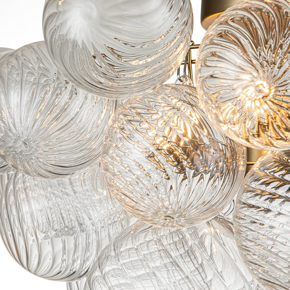 Three-Globe Ceiling Mount Fixture with Textured Glass Shades in Warm Metal Finish for Entry, Dining Room & Living Room