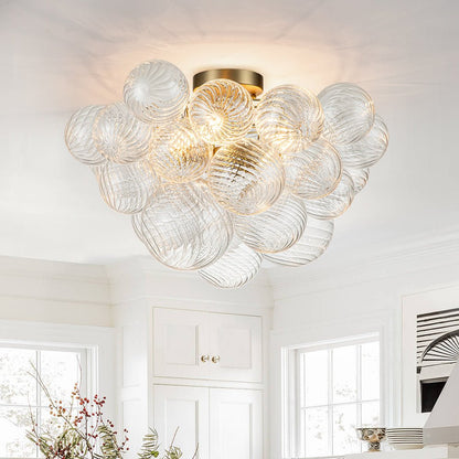 Three-Globe Ceiling Mount Fixture with Textured Glass Shades in Warm Metal Finish for Entry, Dining Room & Living Room