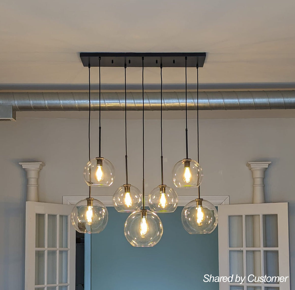 Seven-Globe Hanging Light with Adjustable Height Cords for Kitchen Island & Dining Table, Clear Glass Spheres, 35-Inch Canopy, E26 Base, Dim