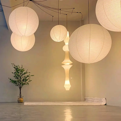 Paper Globe Hanging Light Fixture White Spherical Shade Soft Overhead Illumination for Bedrooms Living Areas Dining Rooms Calm Ambient Light